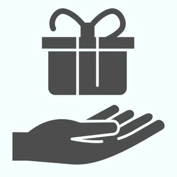 Present giving solid icon. A present on a hand vector illustration isolated on イラスト素材