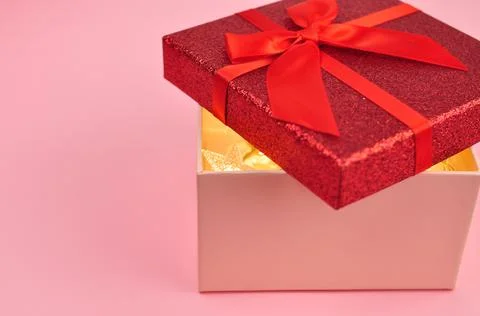 Present red box with bow giving gifts for holidays concept Stock Photos