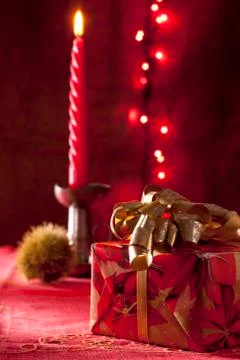 Present with Red Candle Stock Photos