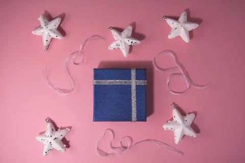 Present with silver ribbon and white shiny stars, ribbon Stock Photos
