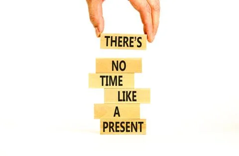 Present time symbol. Concept words There is no time like the present on woo.. Stock Photos