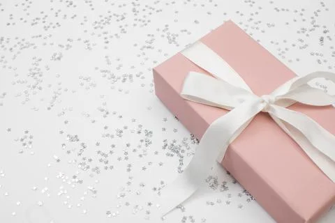 Present on white background with sparkles text place- Image Stock Photos