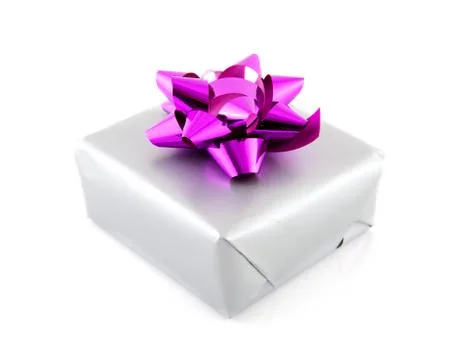 Present wrapped in silver paper and pink ribbon Stock Photos