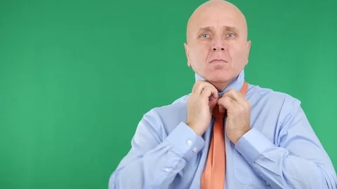 Presentable Businessman Arranges Shirt and Tie Preparing for Business Meeting Video stock 80963605