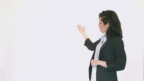 Presentable corporate woman making presentation / forecasting 库存影片 140981239