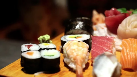 Presentation of assorted sushi on a table Stock Footage 232912924