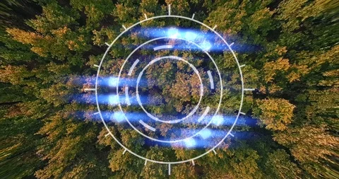 Presentation background combining drone footage of forest and abstract hud icon Stock Footage 126658606