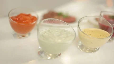 Presentation of a delicious beef served with a variety of sauces for meat 動画素材 78684168