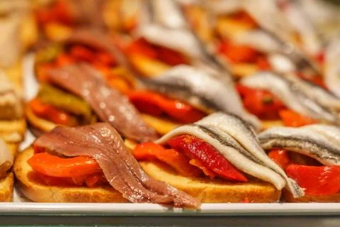 Presentation of food in small quantities, type lid, ready to consume. Fish pr Stock Photos