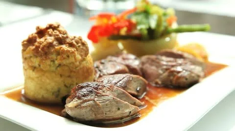 Presentation of fresh lamb filets with vegetables 動画素材 10597717