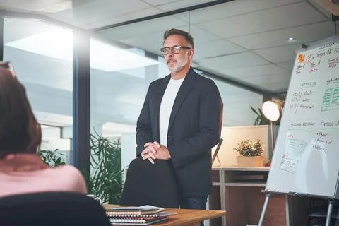 Presentation, ideas and man in office, creative agency and feedback for sub.. Stock Photos