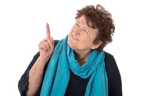 Presentation: isolated beautiful oder woman presenting lateral with her foref Stock Photos