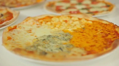 Presentation of Italian pizza. Assorted pizza for every taste. Marguerite Stock Footage 78684289