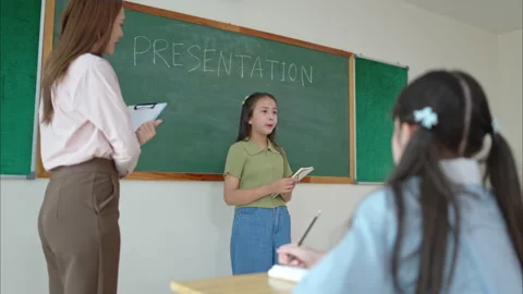 Presentation lesson, Teacher and students in the basic presentation Stock Footage 309924381