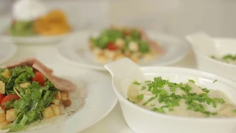 Presentation of the lunch menu. Garnish salad and meat for every day of the week Stock Footage 78684615