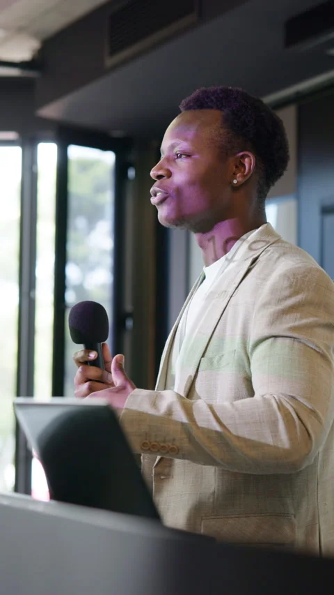 Presentation, microphone and black man in office for training on finance report Stock Footage 334048179