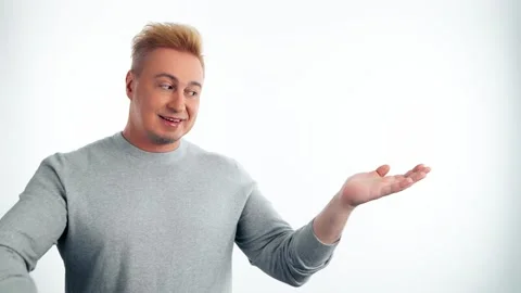 Presentation, mock up and man pointing to advertising, branding. Smiling guy mal Stock Footage 241262363