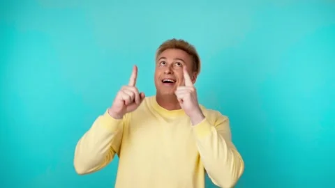 Presentation, mock up and man pointing to advertising, branding. Smiling guy mal 動画素材 249199289