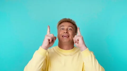 Presentation, mock up and man pointing to advertising, branding. Smiling guy mal Stock Footage 255657518