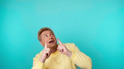 Presentation, mock up and man pointing to advertising, branding. Smiling guy mal Stock Footage 260315562