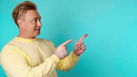 Presentation, mock up and man pointing to advertising, branding. Smiling guy mal Stock Footage 260315575