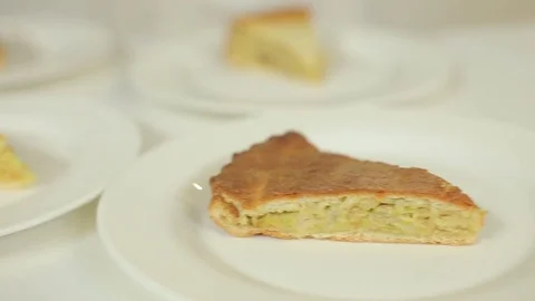 Presentation of potato pie and pie with cabbage and mushrooms Stock Footage 78684211