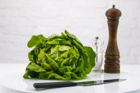Presentation of a salad and its dressing Stock Photos