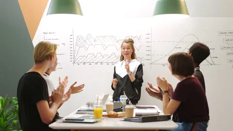 Presentation, strategy and web development team high five for a successful app Stock Footage 213937276