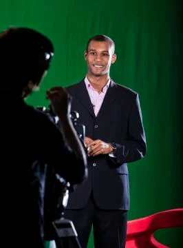 Presenter and camera operator Stock Photos