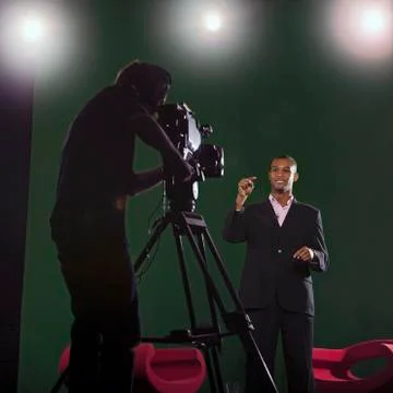 Presenter and studio lights Stock Photos