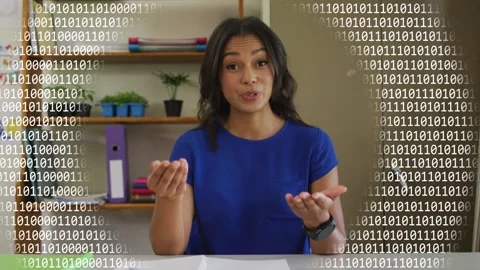 Presenter at desk, speaking and causing binary code to circle head, illustrating Stock Footage 333925441