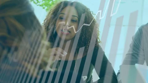 Presenter explaining sales metrics in meeting, checking tablet as data overlay Stock Footage 334693835