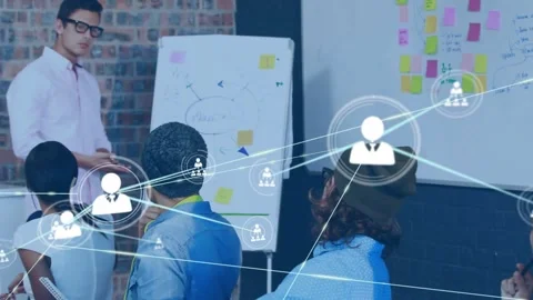 Presenter gesturing at flipchart starting animated user icons lines expanding, Stock Footage 330916853