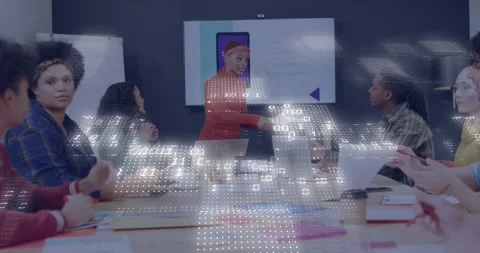 Presenter gesturing at phone mockup handing docs reviewing app design dotted Stock Footage 329471446