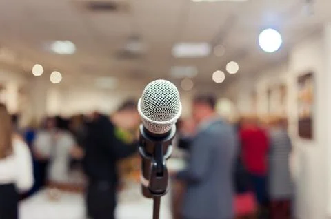Presenter with a microphone. toastmaster at a wedding. mc Stock Photos