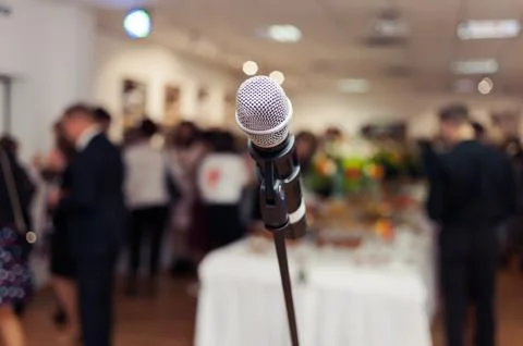 Presenter with a microphone. toastmaster at a wedding. mc Stock Photos