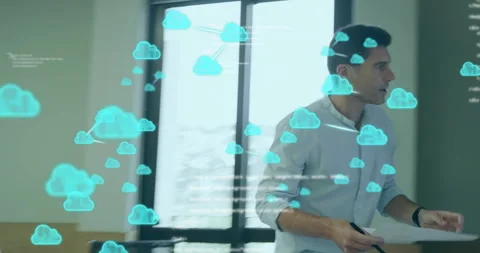 Presenter noticing cloud icons showing cloud computing code then pointing at 動画素材 314868715
