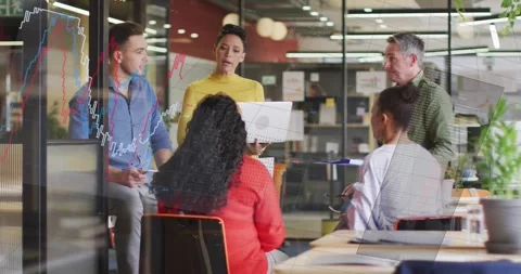 Presenter opening laptop showing data, woman in red pointing phone, charts on Stock Footage 334176273