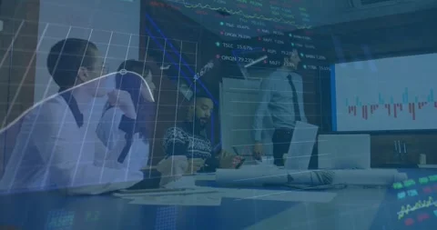 Presenter pointing to chart laptop open finance graphs overlaying table, showing Stock Footage 334835611