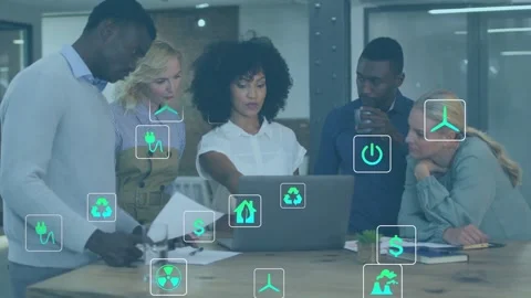 Presenter pointing at laptop, initiating animated sustainability icons while Stock Footage 333477677