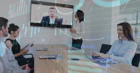 Presenter pointing pointer at screen showing undulating data curve during Video stock 311226634