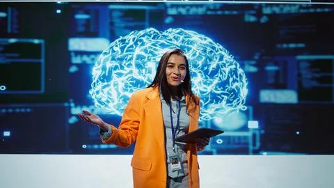 Presenter promoting artificial intelligence business solutions Stock Photos