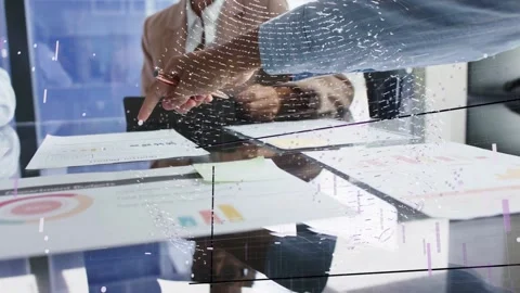 Presenter reaching and pointing chart on glass table in business meeting, Stock Footage 337905022