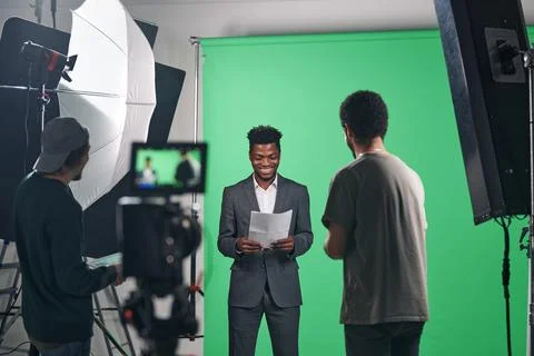 Presenter reading the script before video shooting Foto stock