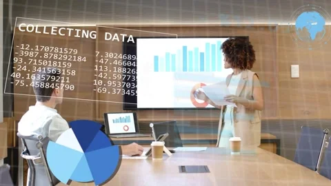 Presenter rising, leaning on table in boardroom, explaining business data with Stock Footage 333526359