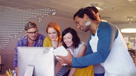 Presenter rotating tablet toward group causing tech map and code overlays while Stock Footage 332747067