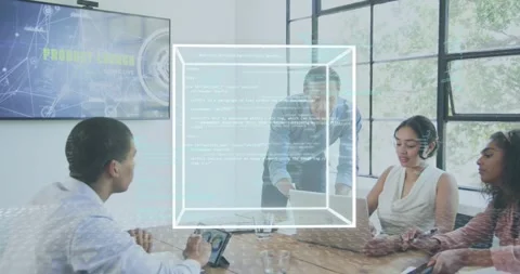 Presenter speaking materializing holographic cube for launch while team tapping Stock Footage 317330999