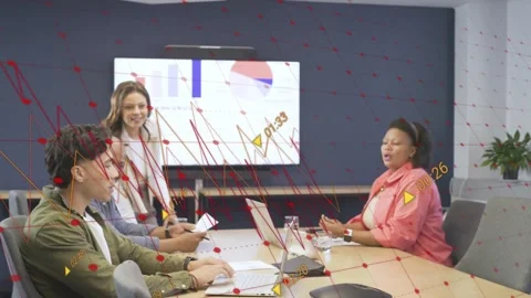 Presenter standing and handing pages, business team reviewing charts and Stock-Footage 333301404