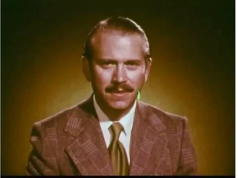 A presenter talks about bleeding and injured miners are shown, in 1975. Stock Footage 74998718