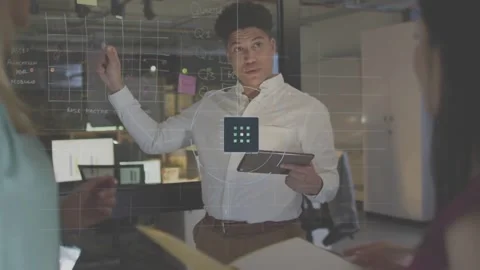 Presenter tapping glass cell and pointing, HUD expanding into network Stock Footage 334036584